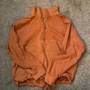 Rust colored Able pullover